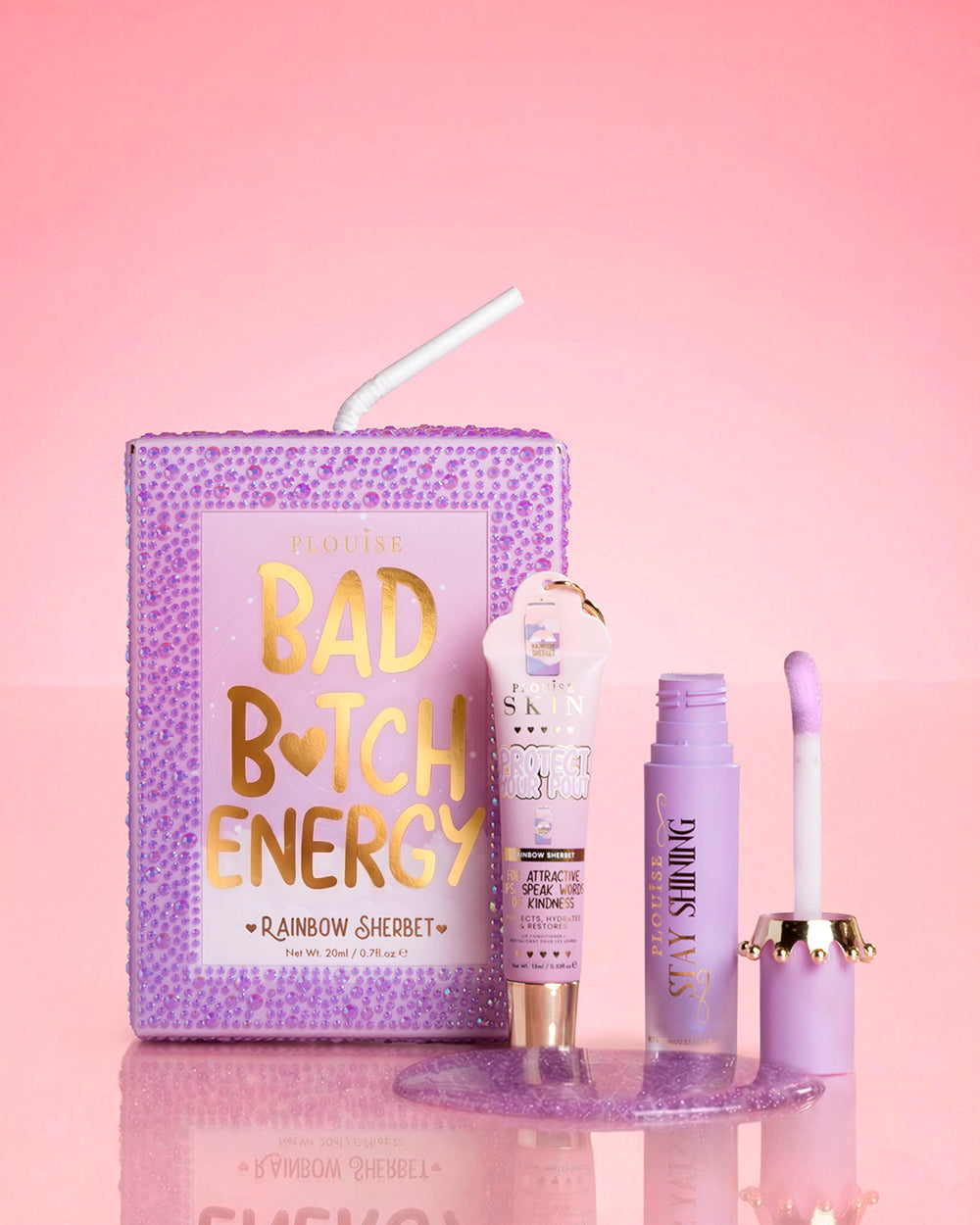 Duo di labbra viola P.Louise Crystal Glitter Bad Bitch Energy in sorbetto arcobaleno caratterizzato da un olio per labbra lucido e un balsamo per labbra