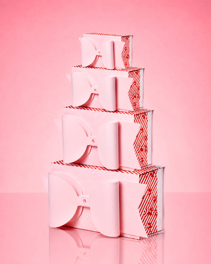 Confezione regalo con fiocco rosa