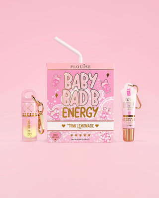 P.Louise Baby Bad Bitch Energy drink package with pink lemonade flavour on a pink background featuring a mini lip conditioner and mini lip oil