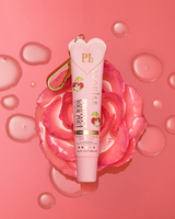 Colorato al profumo di fiori di ciliegio rosa, proteggi il tuo balsamo per labbra con clip dorata sulla parte superiore di un fiore rosa