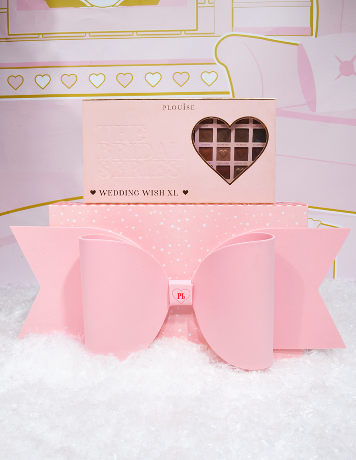 Confezione regalo con fiocco rosa