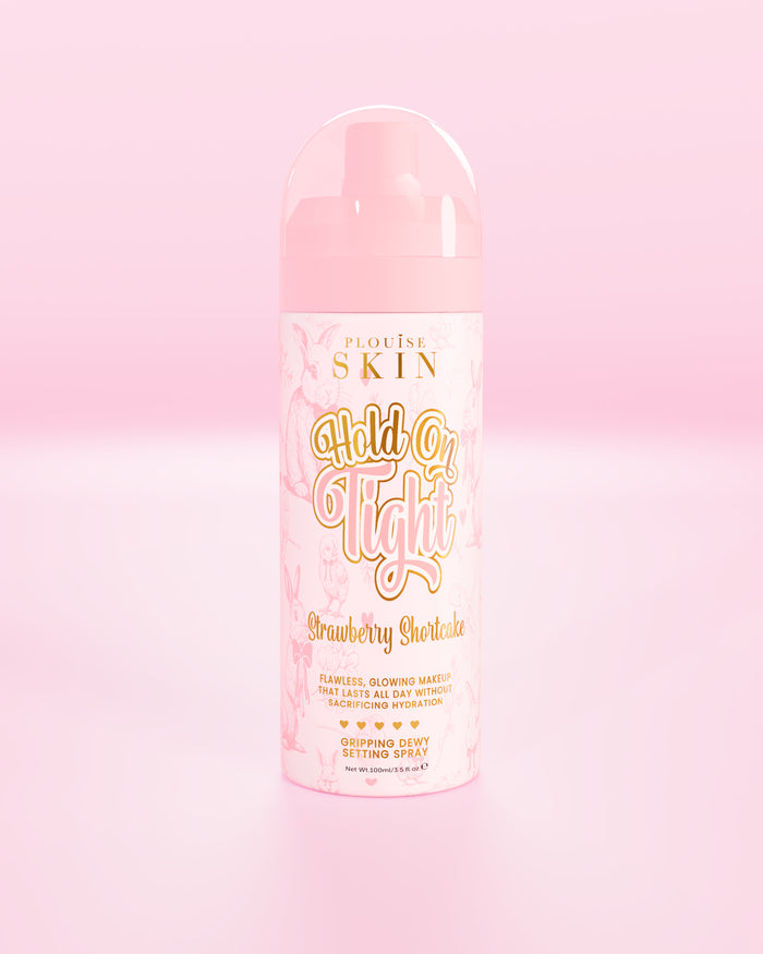 Flacone rosa di P.Louise Hond On Tight spray fissante con effetto rugiadoso in crostata di fragole