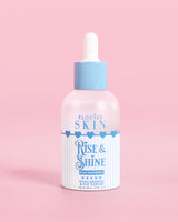 Flacone blu e bianco di PLouise Rise and Shine Hyaluronic Serum in lampone blu