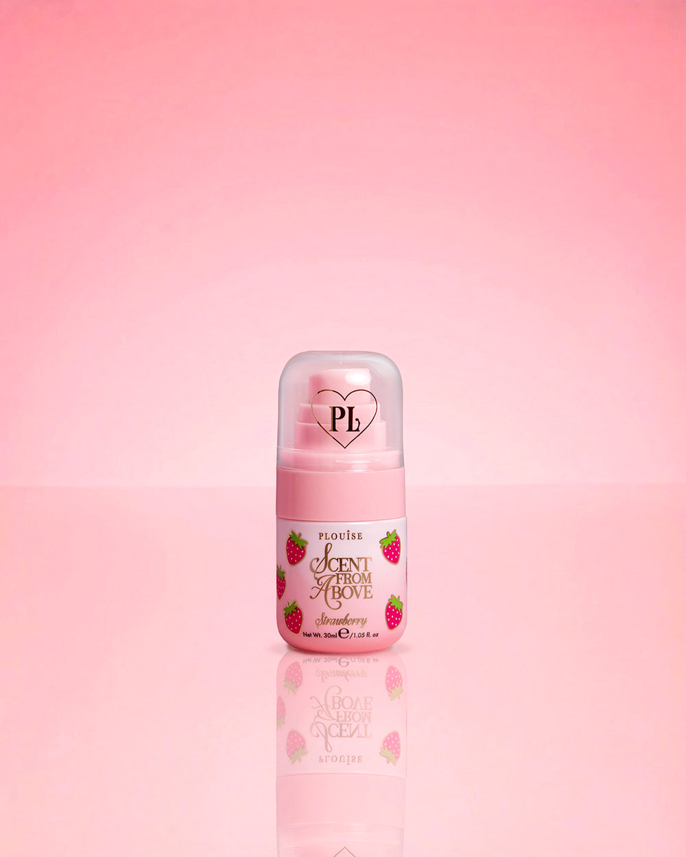 P.Louise Mini Strawberry Hair & Body Mist Scent From Above on a pink background