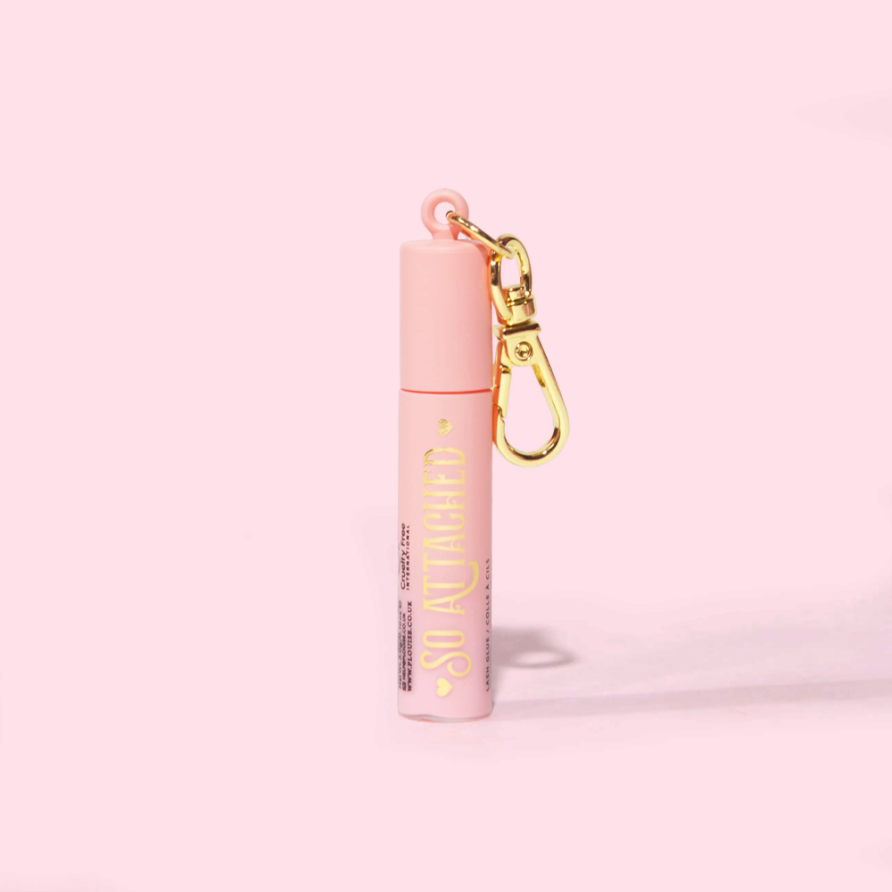 Immagine del mascara antistrappo Mini Portachiavi P.Louise in un tubetto rosa con scritta dorata e accessorio portachiavi dorato