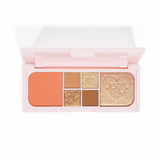 Un'immagine della palette P.Louise Fluffy Fantasy Mini Eyes & Face con matt cremosi e riflessi burrosi in una gamma di tonalità pesca e neutre