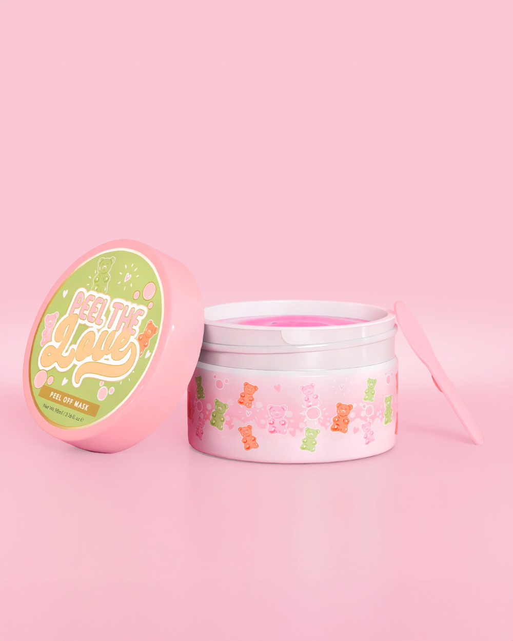 Contenitore rosa con disegno di orsetto di caramelle su sfondo rosa